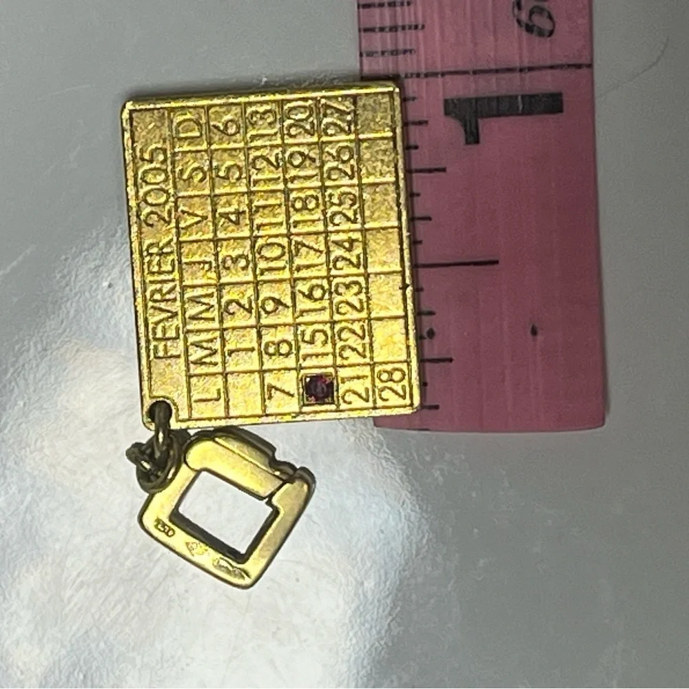 LOUIS VUITTON 18KT GOLD CALENDAR CHARM W/RUBY VINTAGE 2005